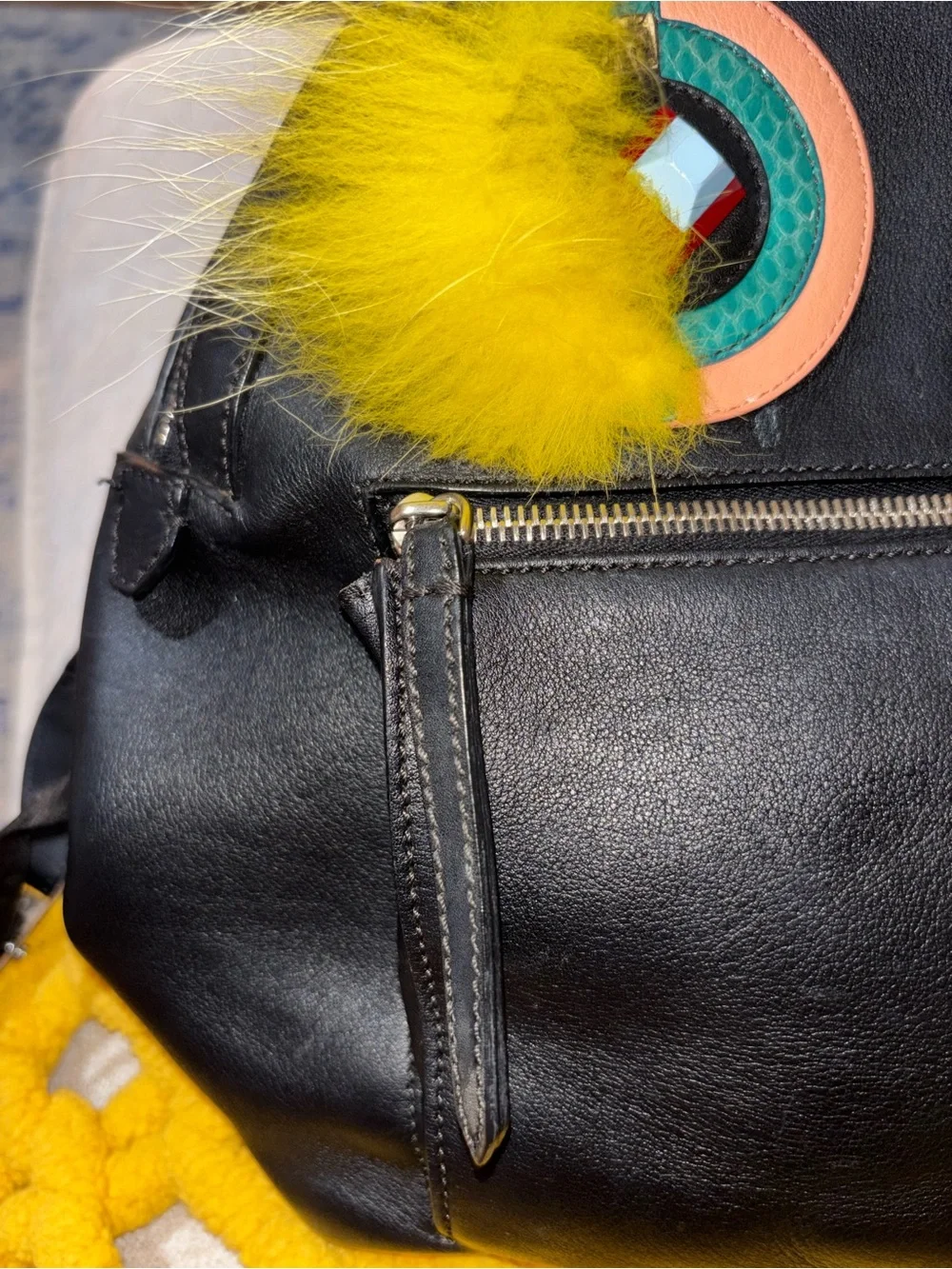Fendi Black Backpack with Yellow Fur Eye Accents